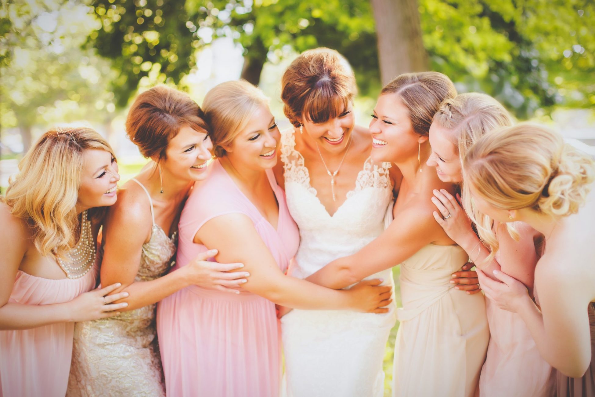a group of women standing next to each other